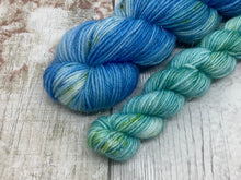 Load image into Gallery viewer, Gold Sparkle Sock Set with a coordinating minis skein in the Reef Colourway