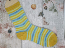 Load image into Gallery viewer, Silver Sparkle Self Striping Yarn in Life's A Beach colourway with a coordinating mini skein