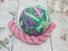 Load image into Gallery viewer, Silver Sparkle Self Striping Yarn in Heather colourway with a coordinating mini skein