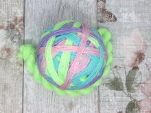 Load image into Gallery viewer, Deluxe Merino Nylon Self Striping Yarn in 'Feelings of Spring' colourway with a coordinating mini skein