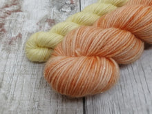 Load image into Gallery viewer, Gold Sparkle 50+20g Sock Set In Orange and Mango Sorbet colours