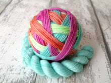 Load image into Gallery viewer, Silver Sparkle Self Striping Yarn in Summer Dream colourway with a coordinating mini skein