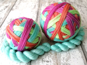 Silver Sparkle Self Striping Yarn in Summer Dream colourway with a coordinating mini skein