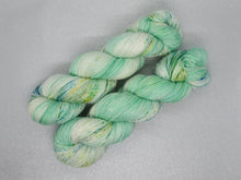 Load image into Gallery viewer, Deluxe Silver Sparkle 100g skein in Mistletoe Kisses colourway