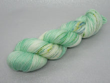 Load image into Gallery viewer, Gold Sparkle Sock Yarn 100g skein in Mistletoe Kisses Colourway