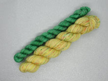 Load image into Gallery viewer, Silver Sparkle 4ply 50g in Jingle All The Way colourway with a Green Speckled mini skein