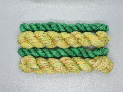 Silver Sparkle 4ply 50g in Jingle All The Way colourway with a Green Speckled mini skein