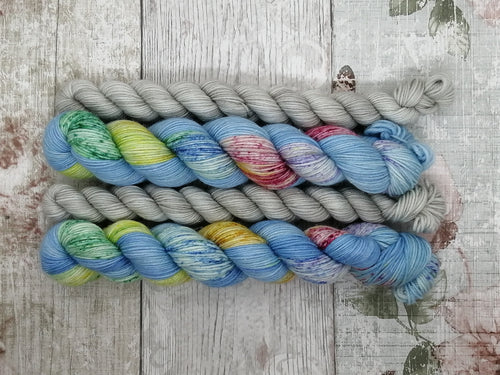 Silver Sparkle 4ply 50g in Blue Sky with Rainbows colourway with a mini in Silver Lining