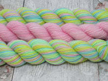 Load image into Gallery viewer, Silver Sparkle Self Striping Yarn in If You&#39;re Happy and You Know It colourway with a coordinating mini skein