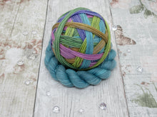 Load image into Gallery viewer, DYED TO ORDER Silver Sparkle Self Striping Yarn in Autumn Rainbow colourway with a matching mini skein