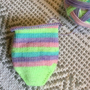 Biosock Merino Nylon Self Striping Yarn in 'Feelings Of Spring' colourway with a matching mini skein