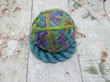 Load image into Gallery viewer, DYED TO ORDER Silver Sparkle Self Striping Yarn in Autumn Rainbow colourway with a matching mini skein