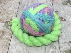 Silver Sparkle Self Striping Yarn in 'Feelings Of Spring' colourway with a matching mini skein