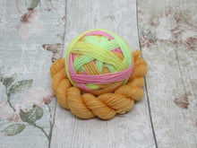 Load image into Gallery viewer, Silver Sparkle Self Striping Yarn in Lolly colourway with a coordinating mini skein