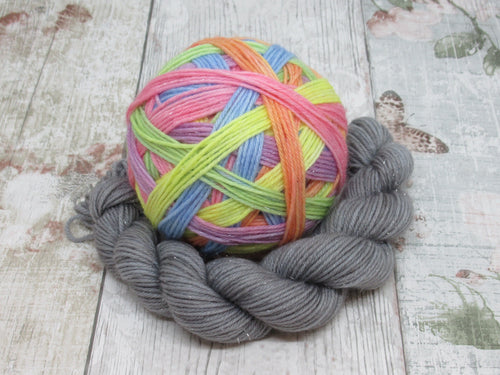 DYED TO ORDER Silver Sparkle Self Striping Yarn in Rainbows and Stormclouds colourway with a coordinating mini skein