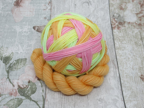 Merino Nylon DK Self Striping Yarn in Lolly colourway with a coordinating mini skein